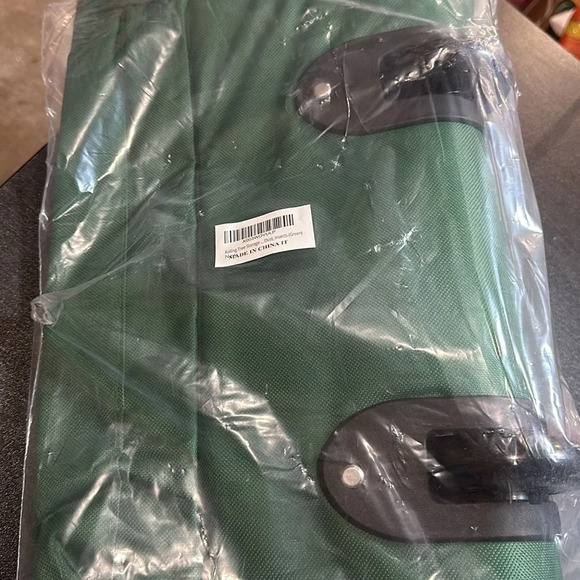 Green rolling bag for Xmas tree storage. Fits up to 7.5 fr disassembled tree. - Picture 2 of 2